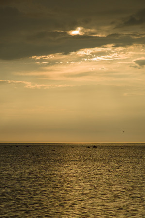 Sunset clouds over seascapeの写真素材