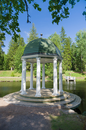 Rotunda in the park near pondの写真素材
