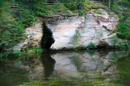 Cave in sandstone outcrops of Ahja river, Estoniaの写真素材