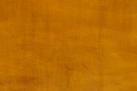 Concrete wall, orange textured backgroundの写真素材