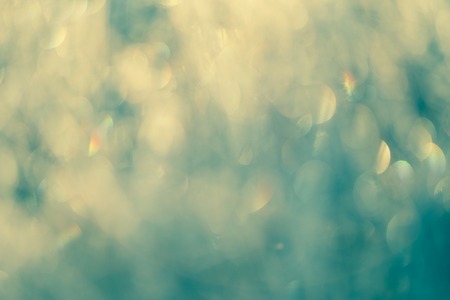 Natural background with bokeh lights, vintage toned imageの写真素材