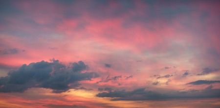 Panorama of dramatic sunset sky with colorful cloudsの写真素材
