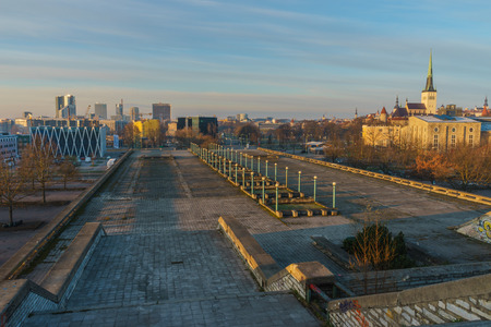 Tallinn, Estonia - April 24, 2016: Architecture of medieval time, soviet era and modern days side-by-side. Overlook view from Linnahall by early morning.のeditorial素材