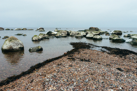 Stony coast of Baltic sea by winter timeの写真素材