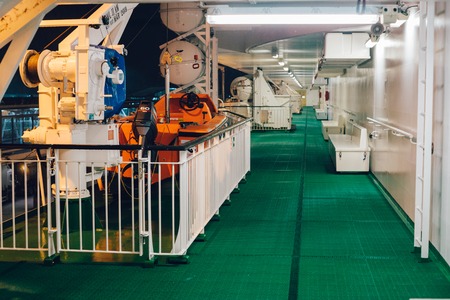 STOCKHOLM, SWEDEN - 11 JAN 2017: Rescue boat on promenade deck of Baltic Queen cruiseferry owned by the Estonia-based ferry operator Tallink.のeditorial素材