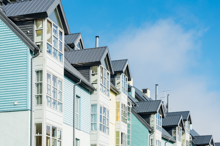 Modern residential house facade against blue sky, real estate conceptの写真素材
