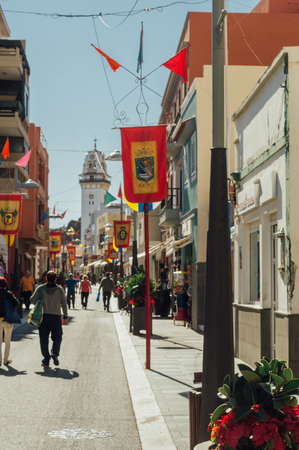 CANDELARIA, SPAIN - JANUARY 20, 2016: Tourists walking by Obispo Perez Caceres pedestrian street toward Basilica of Candelaria.のeditorial素材