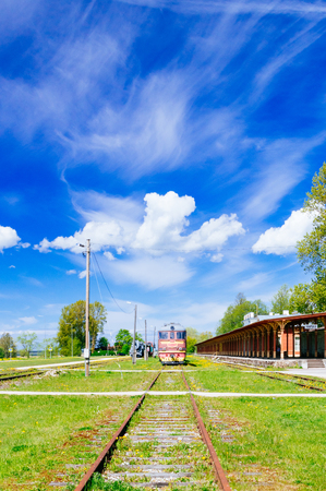 Retro locomotive train and inoperative railway station in Haapsalu, Estonia