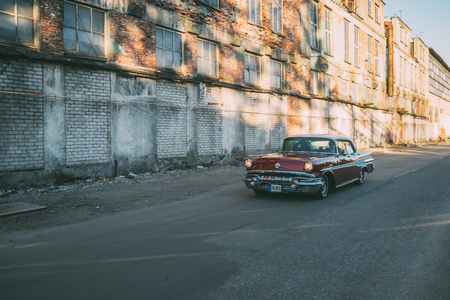 TALLINN, ESTONIA - MAY 6, 2017: American Beauty Car Show, in motion 1957 Pontiac Star Chief on street of Kalamaja district.のeditorial素材