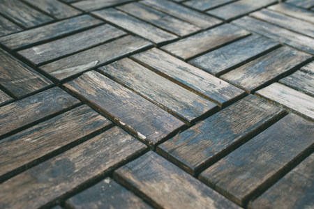 Closeup on old floor. Wethered wooden background. Selective focus side viewの写真素材