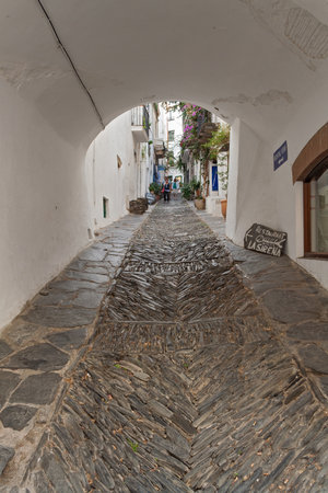 Narrow street in historical center of Cadaques, Cataluya, Spainのeditorial素材