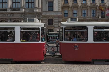 Old crowded tram on the street of Viennaのeditorial素材