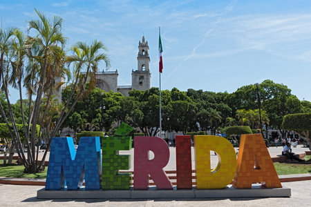 Colored lettering of the mexican city Merida with mexican flag and cathedralのeditorial素材