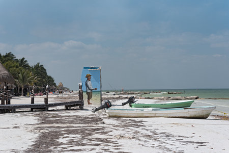 fishing boats on the beach at holbox island, mexico