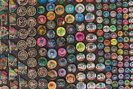 stall with handmade, colorful mexican souvenirs in chichen itza, mexico.