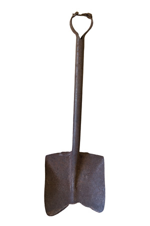 An old rusty shovel with handle it, isolatedの写真素材