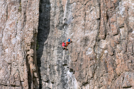 Two climbers in a rock face at El Chalten, Argentinaのeditorial素材