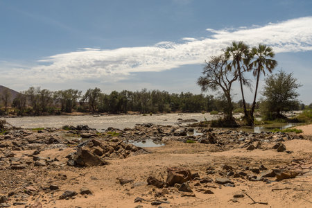 Landscape view of the Kunene River, the border river between Namibia and Angola