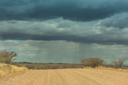 Landscape with rain clouds in the west of the capital Windhoek, Namibiaの写真素材