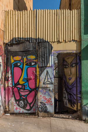 Graffiti street art on the walls and buildings of Valparaiso, Chileのeditorial素材