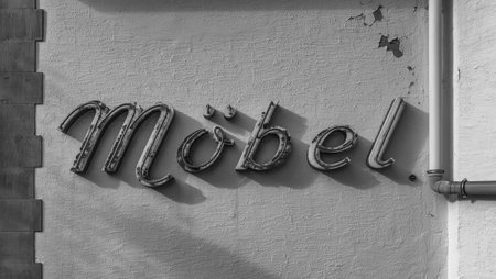 old rusted neon sign with the word furnitureの写真素材