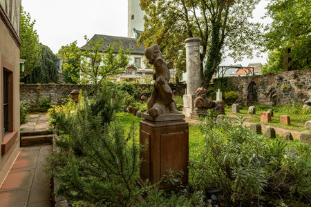 Old sandstone figures in the castle of Frankfurt Hoechst, Germanyの写真素材
