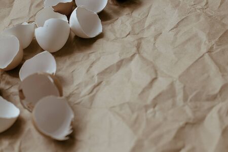 Eggshell on beige background, eggs isolatedの写真素材