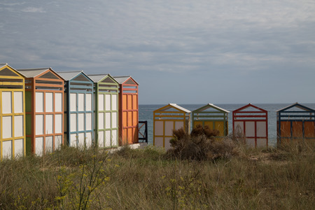 Colorful beach huts in good weather.の写真素材