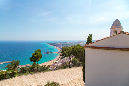 White, Romantic , latin american church with sea view.の写真素材