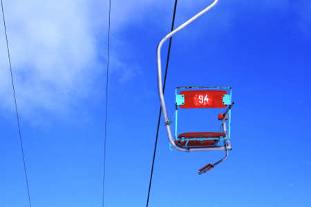 A photo of a chair lift at mountain resort