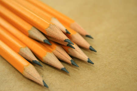 A photo of a pencils on a list of paper