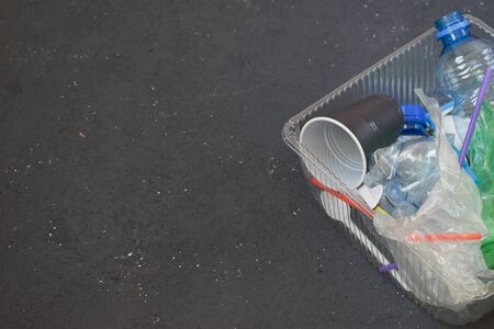 Plastic debris is a view from the top against a dark background.の写真素材