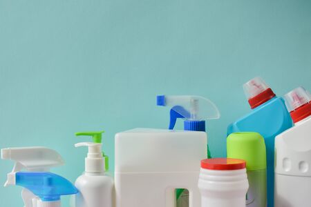 Various bottles for washing sponges, rags and gloves with brushes. Everything for cleaning in one place. Inventory for the maid.の写真素材