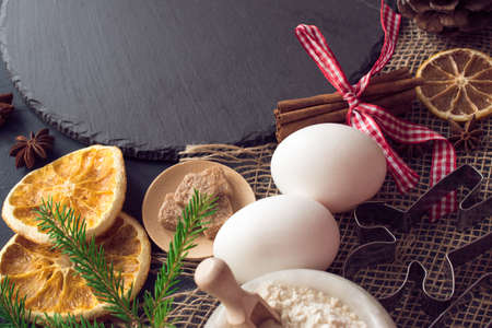 Holiday food. Ingredients for making Christmas cookies with a copy of space. Homemade cake. Glazed...
