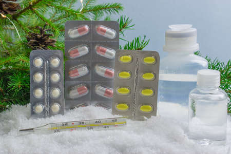 A medical banner with pills and a thermometer. new year's medicine. The medical. New year's eve