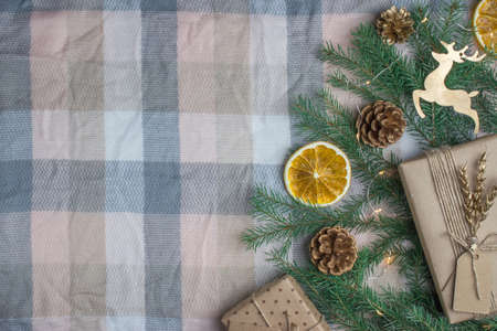 Christmas composition on a wooden background with Golden letters and a deer there is a place for text. The view from the top. Happy New year and merry Christmas.の写真素材