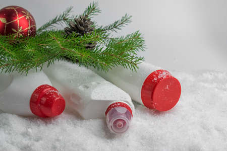 Detergents are lying on the snow.
