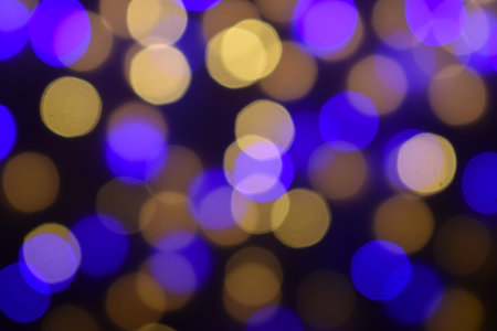 The glitter of the lights in the blur. Bokeh background. New year and Christmas.の写真素材