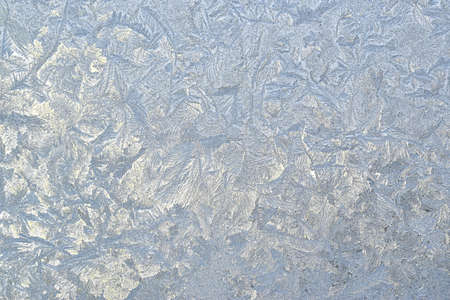 Ice background. Frost on the window. Abstract natural background.