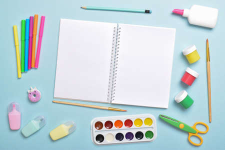 An open notebook on the background of stationery. Back to school. Flat layout, top view, a place to copy. Flat layout, top view, a place to copy.の写真素材