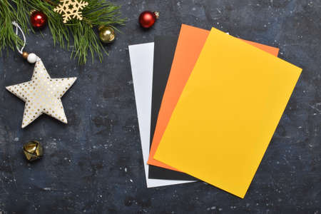 DIY tiger. Step by step. Handmade. Step 1. Prepare colored paper. Copy space. Flat lay, top view.の写真素材