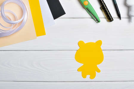 DIY tiger. Step by step. Handmade. Step 1. Cut out the tiger's torso. Flat lay, top view.の写真素材