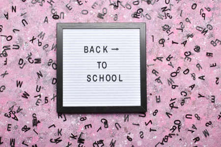 Felt board with the inscription back to school.