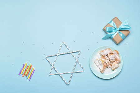 Background for a festive Hanukkah banner with a place for text. Flat lay composition for the Jewish holiday of Hanukkah. Copy space. Flat lay, top view.の写真素材