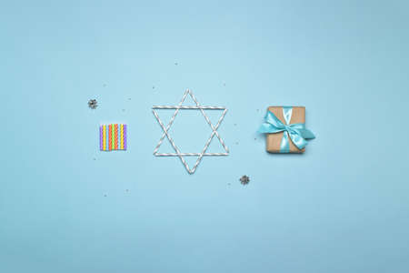 A flat composition for the Jewish holiday of Hanukkah. Copy the space. Flat layout, top view.の写真素材