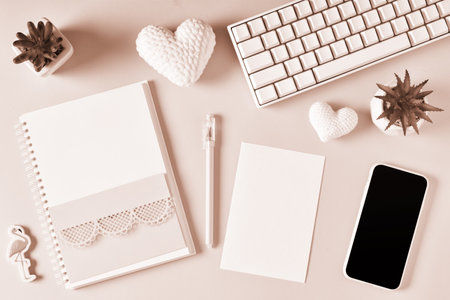 The desktop, the layout of a kraft envelope with a place for text with a smartphoneの写真素材