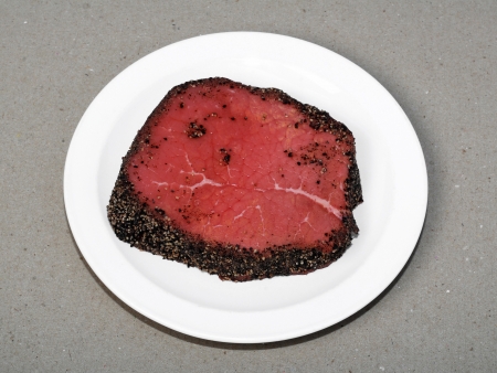 Pepper steak on a white plateの写真素材