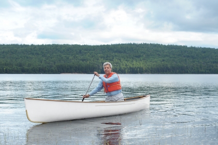 Senior canoe paddlerの写真素材