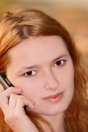 Telephone conversation of the beautiful womanの写真素材