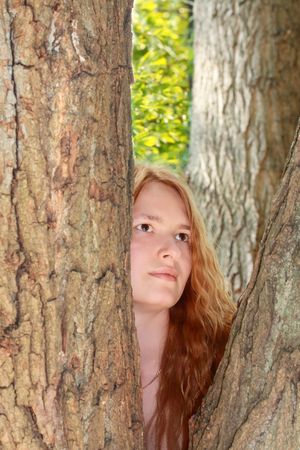 Dryad of the tree. Portrait of the pretty girl.